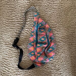Kavu Pink and Teal Geometric Sling Bag